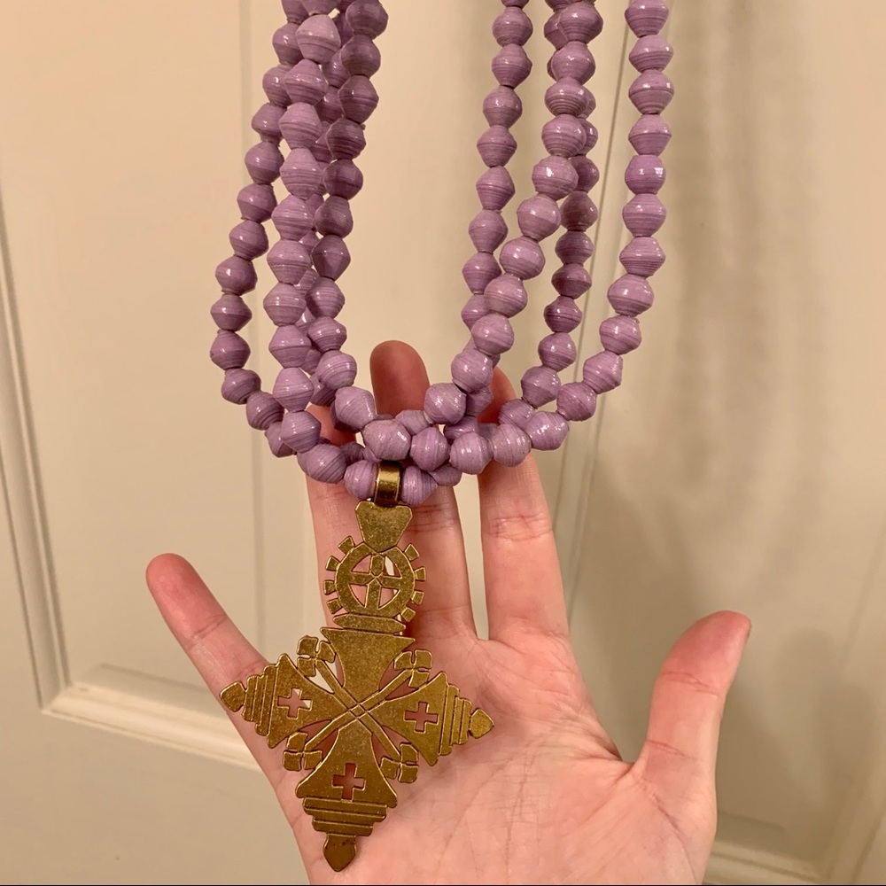 Lavender Akola necklace with gold cross. Long